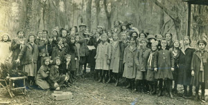 Professor Hoxie playing his violin for the Girl Scouts, at Lowlands, Bona Bella, c.1917-1919. From the Walter John Hoxie Papers, MS 403.