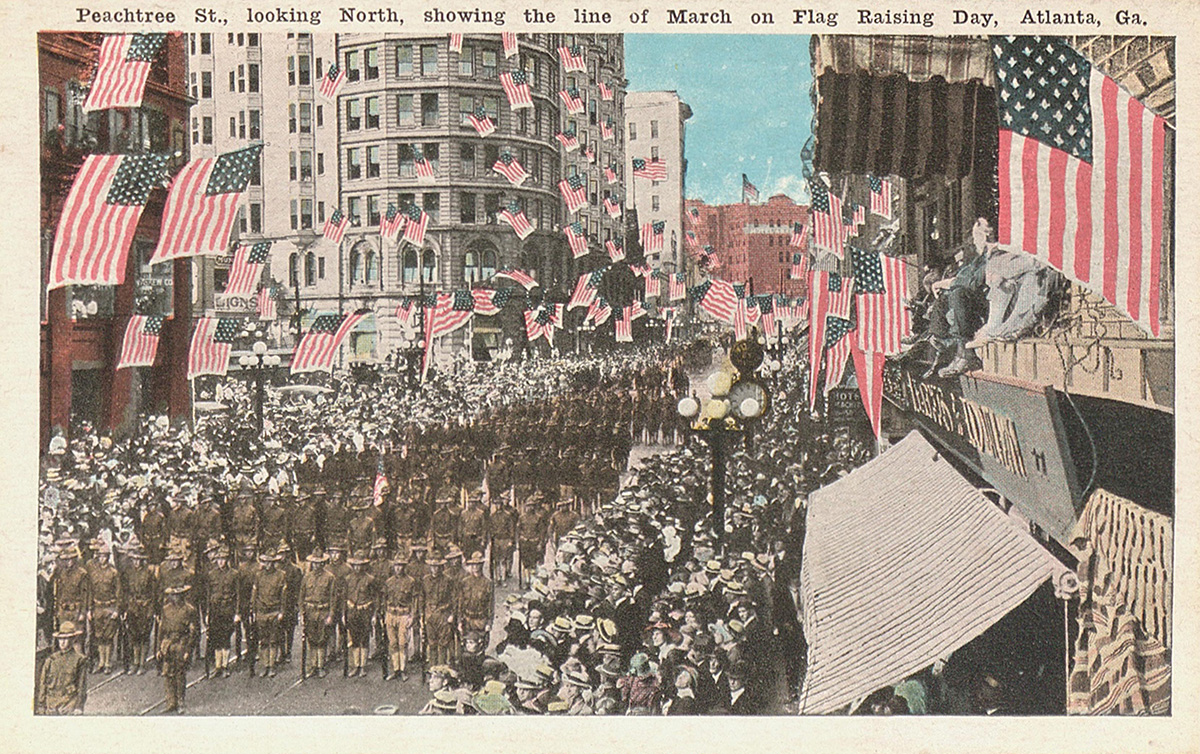 Peachtree Street looking north showing line of march on Flag Raising Day. Undated. GHS 1361-PC Georgia Historical Society postcards collection.